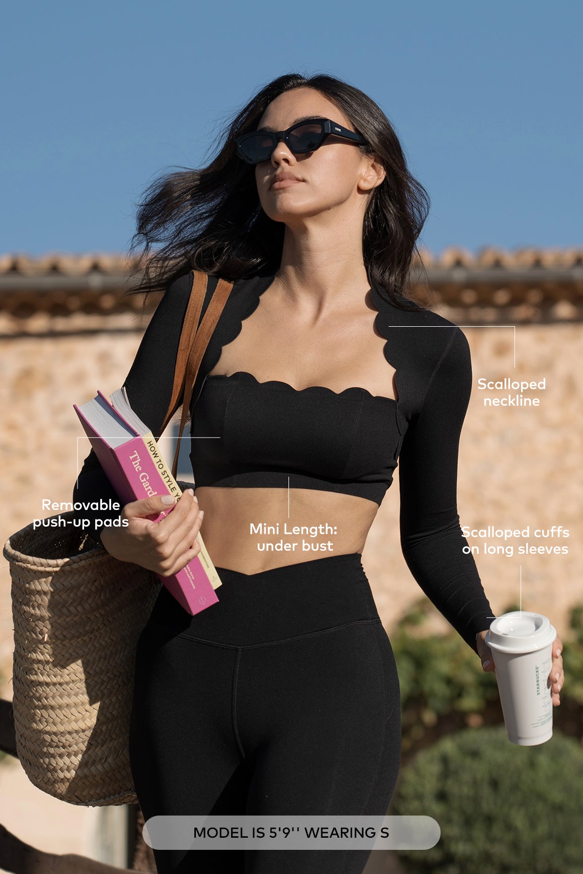 WISKII scallop cropped long sleeve top in soft fabric, featuring a stylish scalloped hem and fitted silhouette.