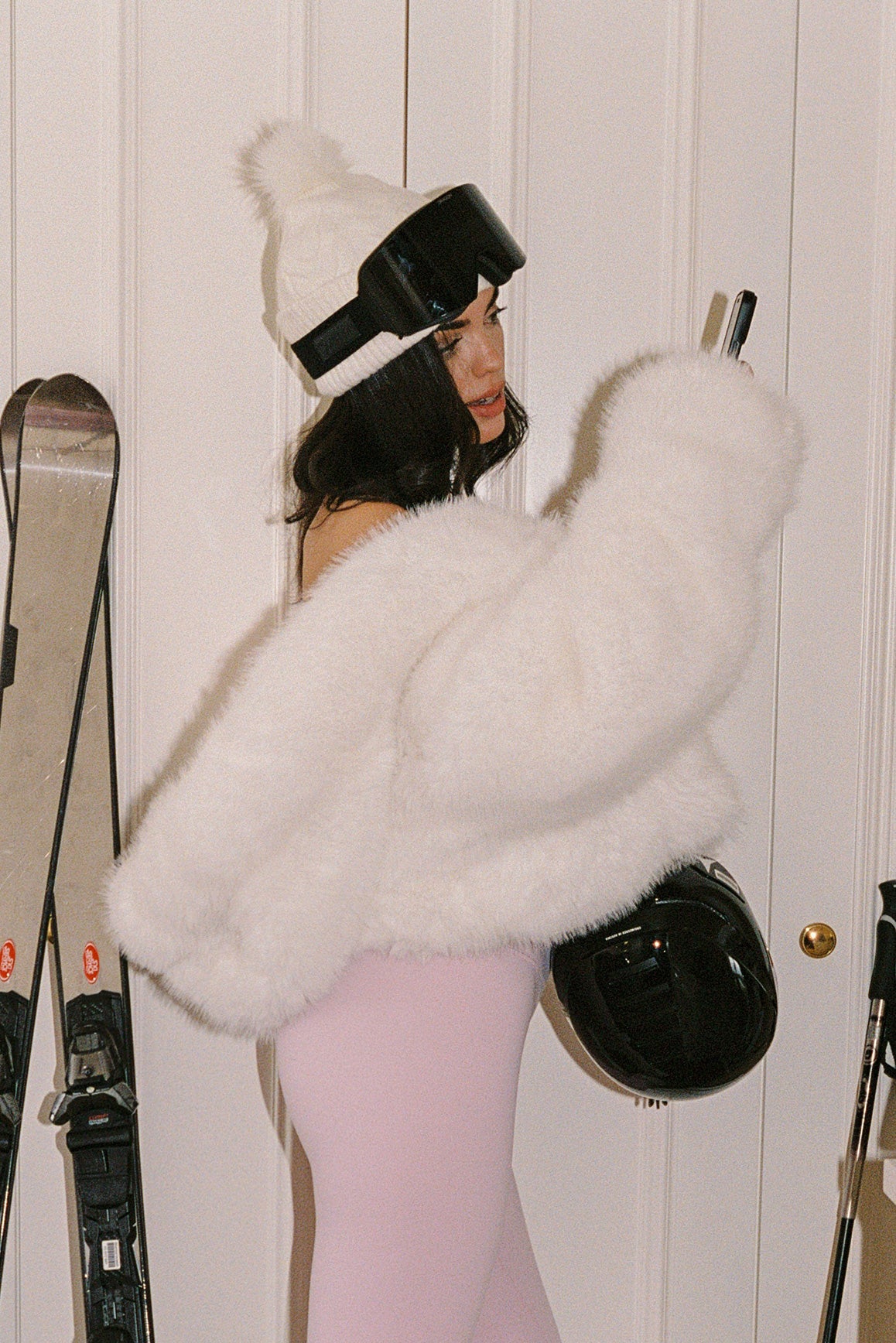 WISKII Alpine Cloud Faux Fur Jacket featuring a plush hood and soft faux fur, stylishly designed for warm winter wear.