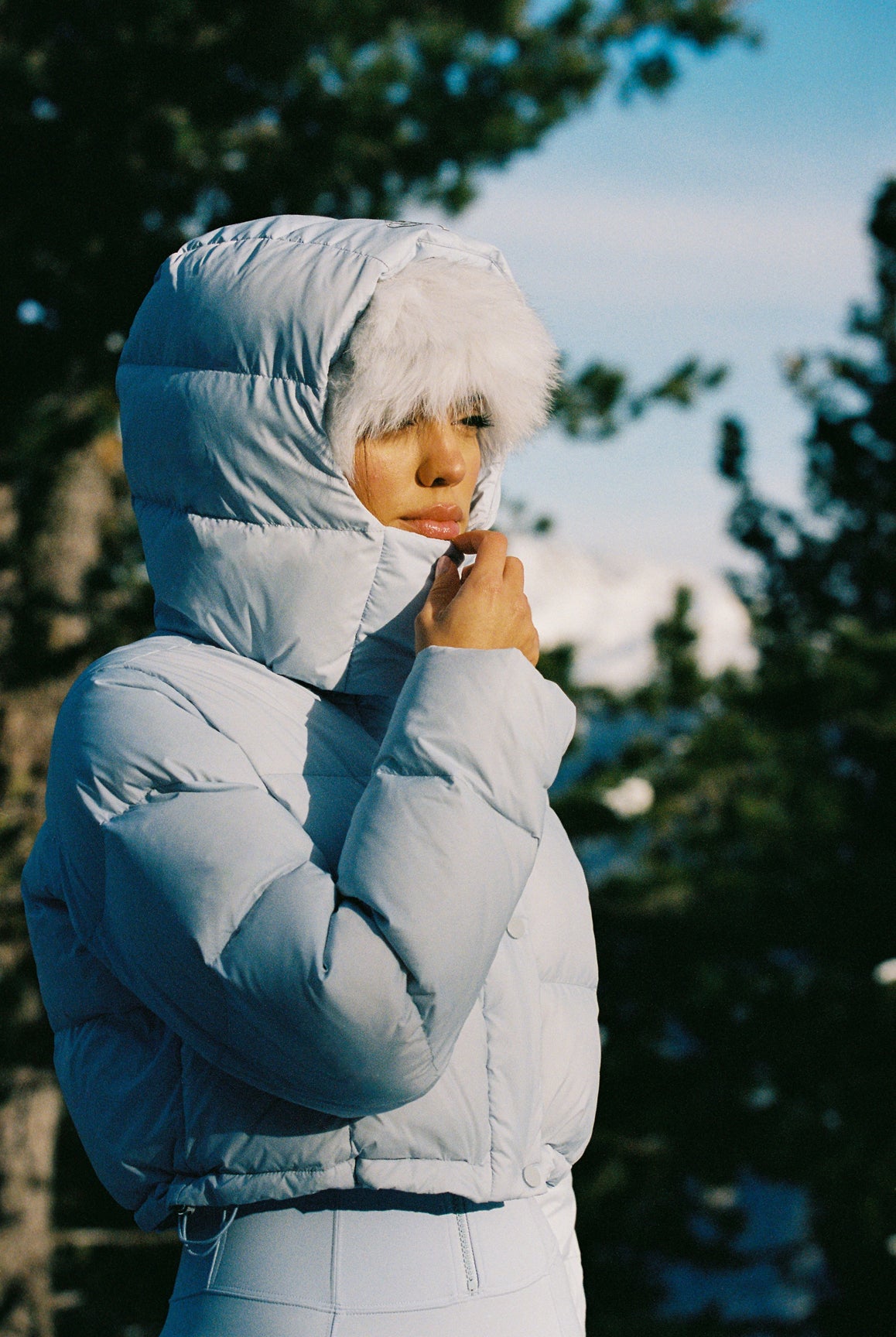 Model wears WISKII Goose Down Water-Repellent Jacket | WISKII Active | Heavenly Blue