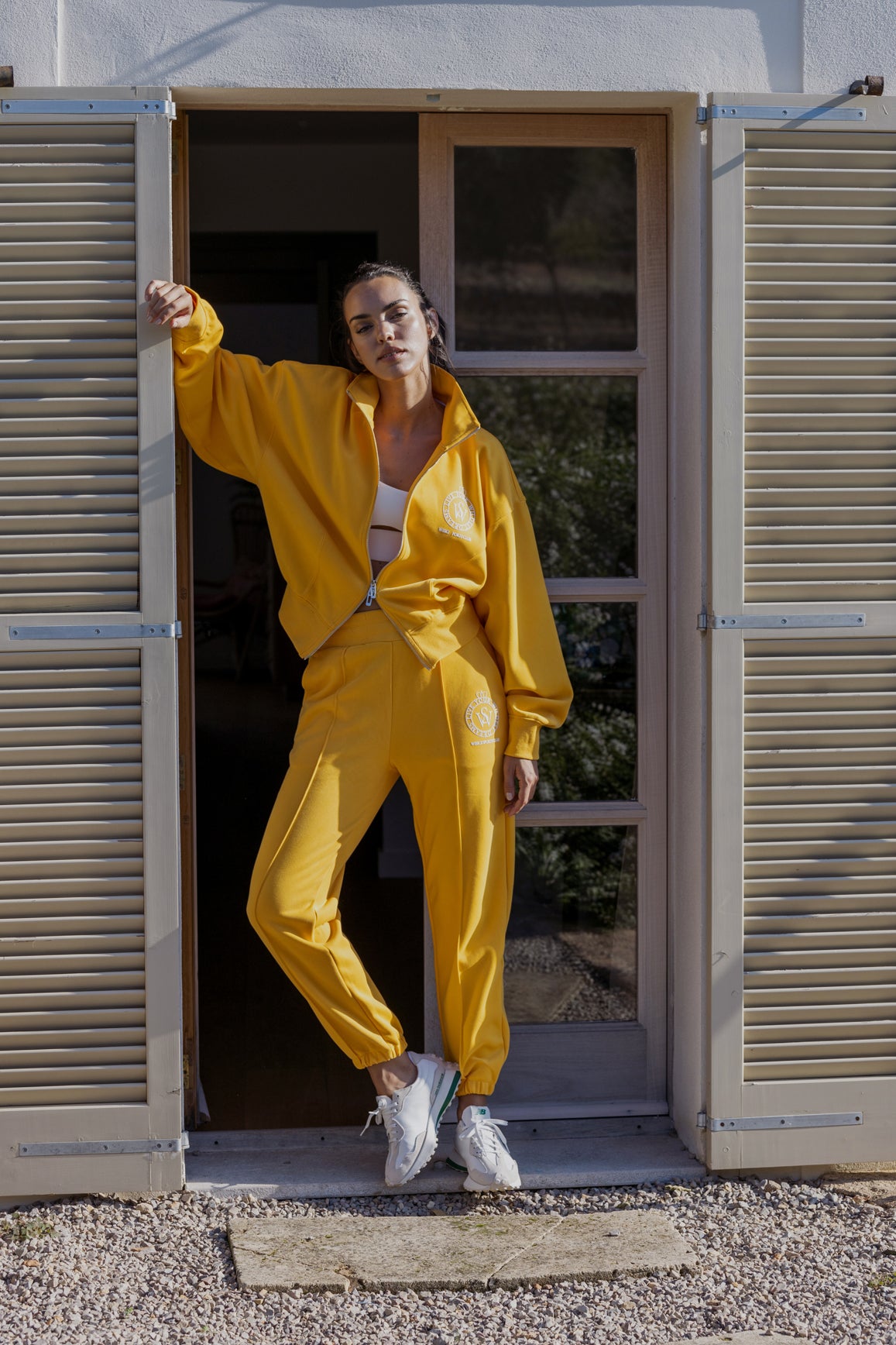 Ivory relaxed high-waist jogger by WISKII featuring a comfortable fit and soft fabric ideal for casual wear.