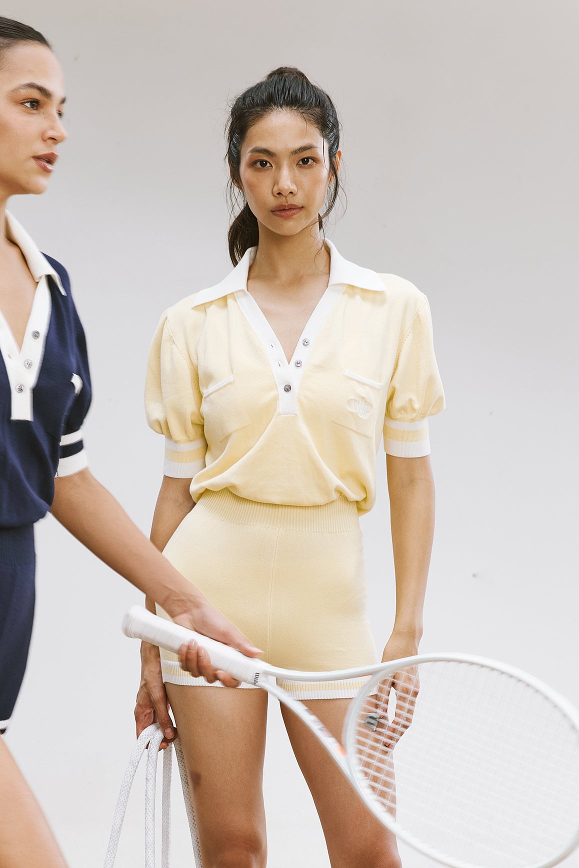 WISKII lemon chiffon V-neck polo short sleeve playsuit, stylish jumpsuit with a relaxed fit and short sleeves.
