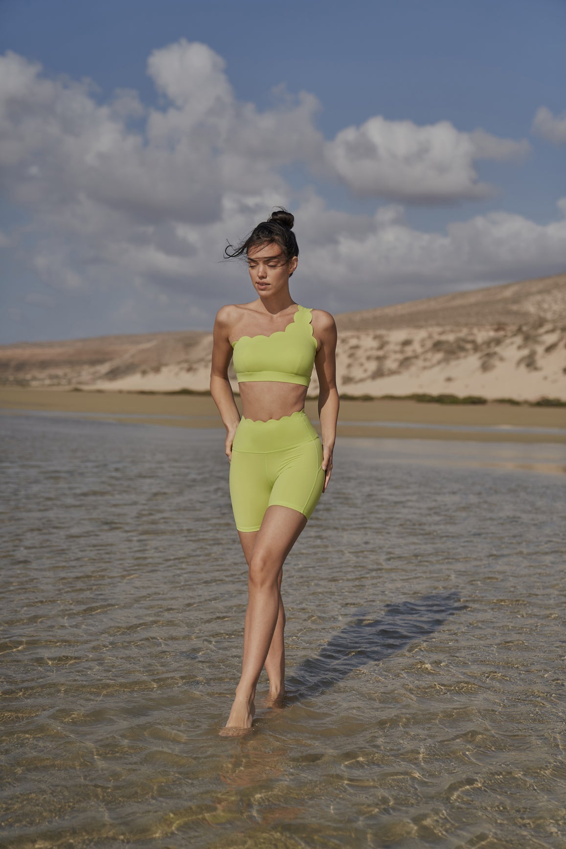 WISKII high-waist sculpting biker shorts in bitter lime, stretchy athletic shorts with a fitted design for workout and casual wear.