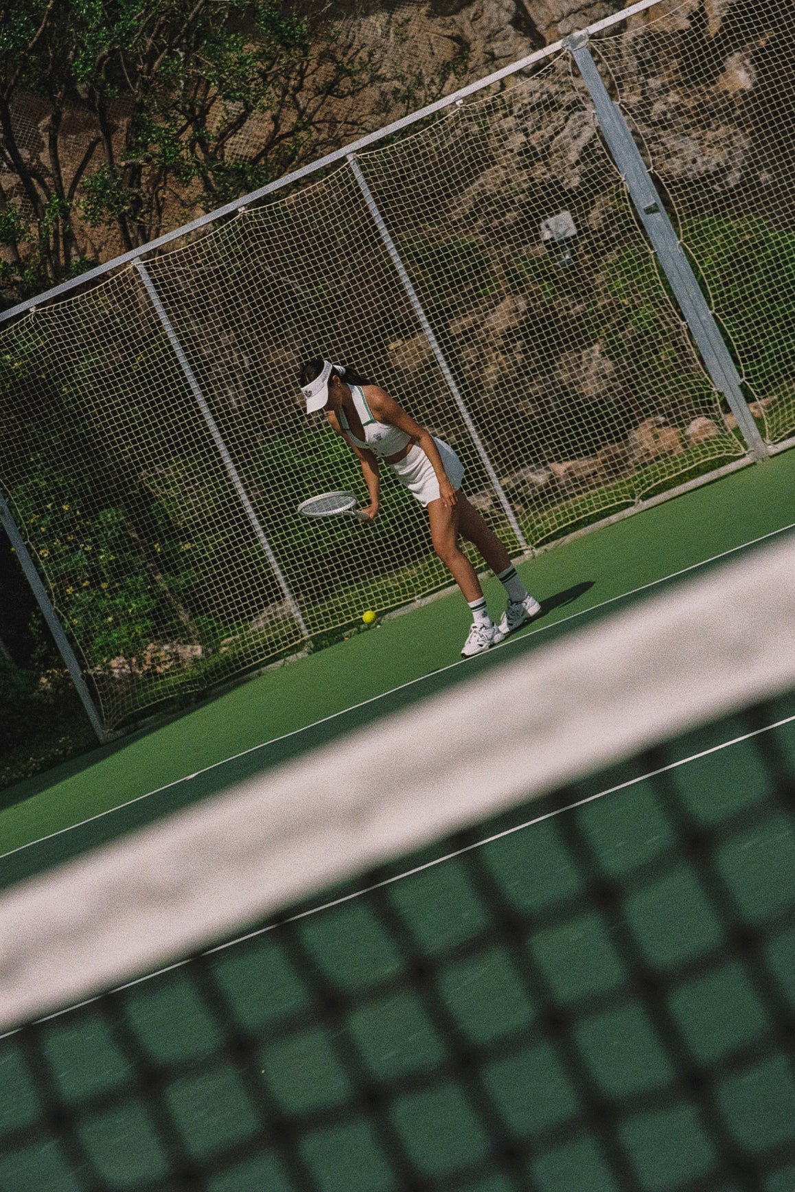 WISKII Riviera Jacquard Knit Skirt in white, featuring a textured pattern and a fitted, stylish design.