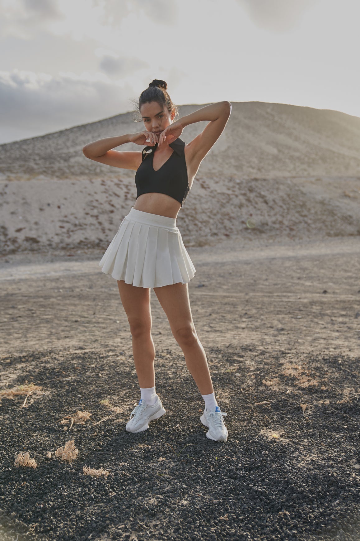 Model wears WISKII Sleeveless Polo Tank Top