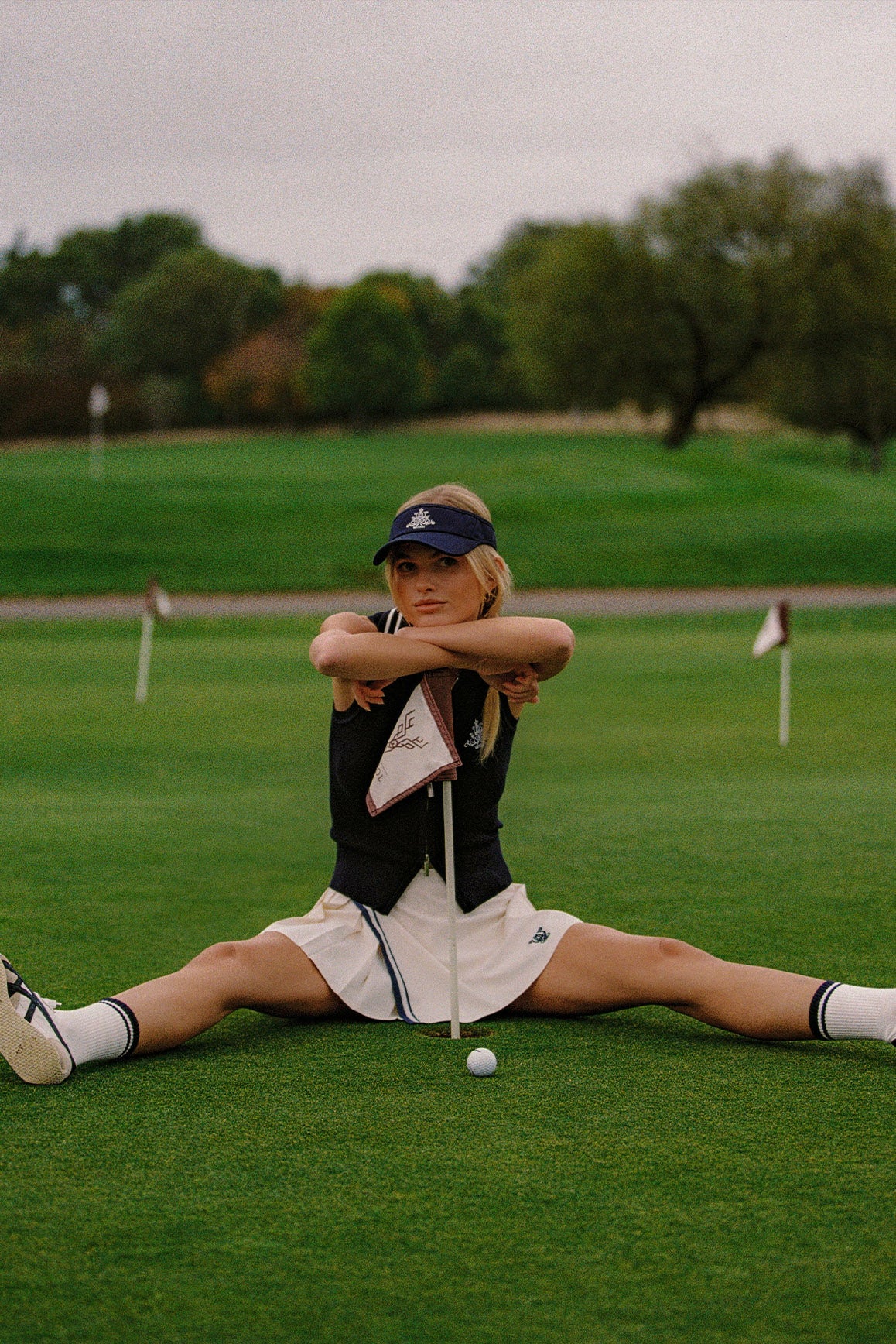WISKII Slim-Fit Cable Knit Zip Tank Vest, close-up of a stylish black sleeveless cable knit vest with front zipper detail.