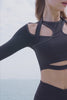 model wears a WISKII Flex Sports Long Sleeve Crop Top