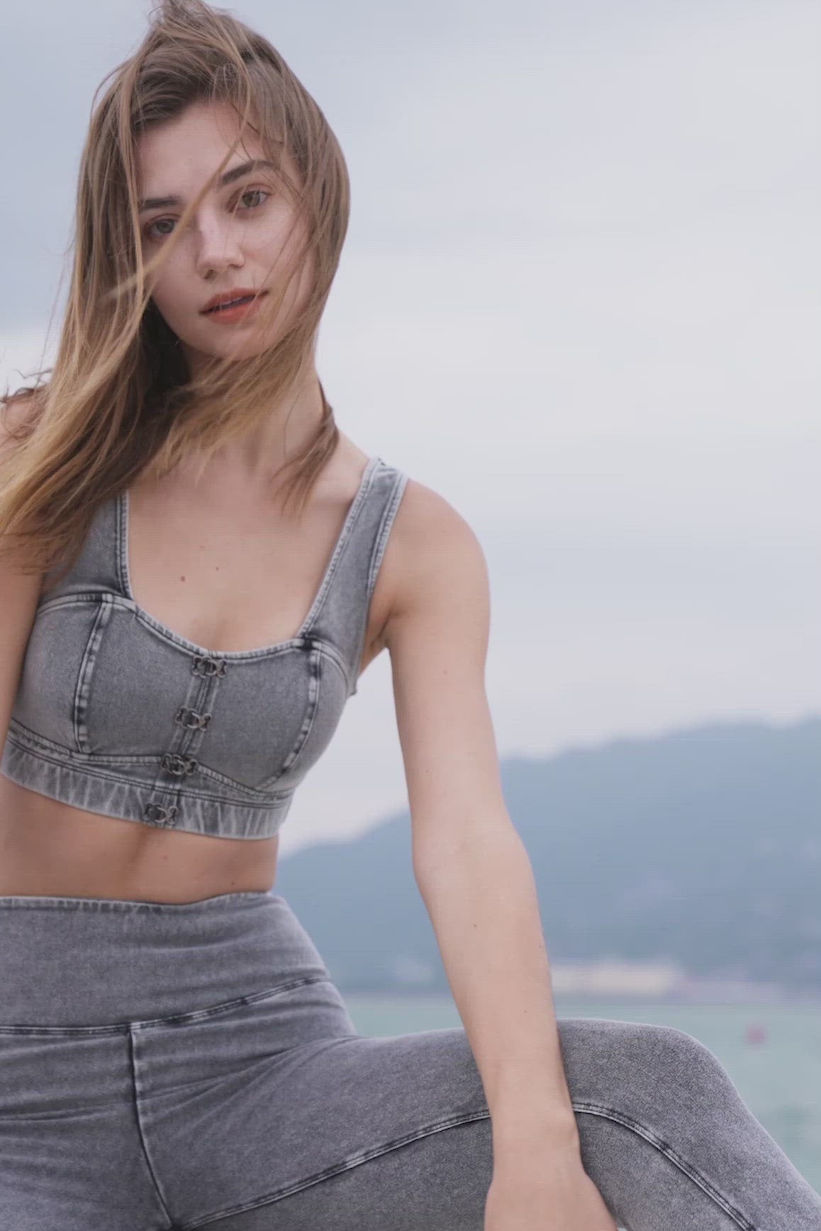 model wears WISKII denim activewear set