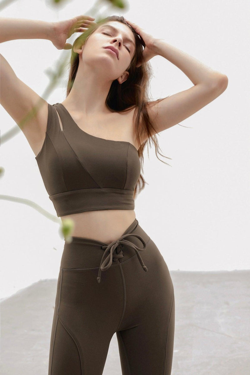 model wears a dynamic one shoulder sports bra