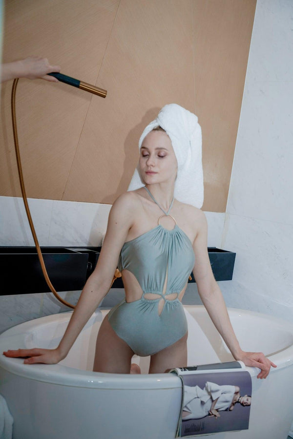 model wears a WISKII Percée One-Piece Swimsuit