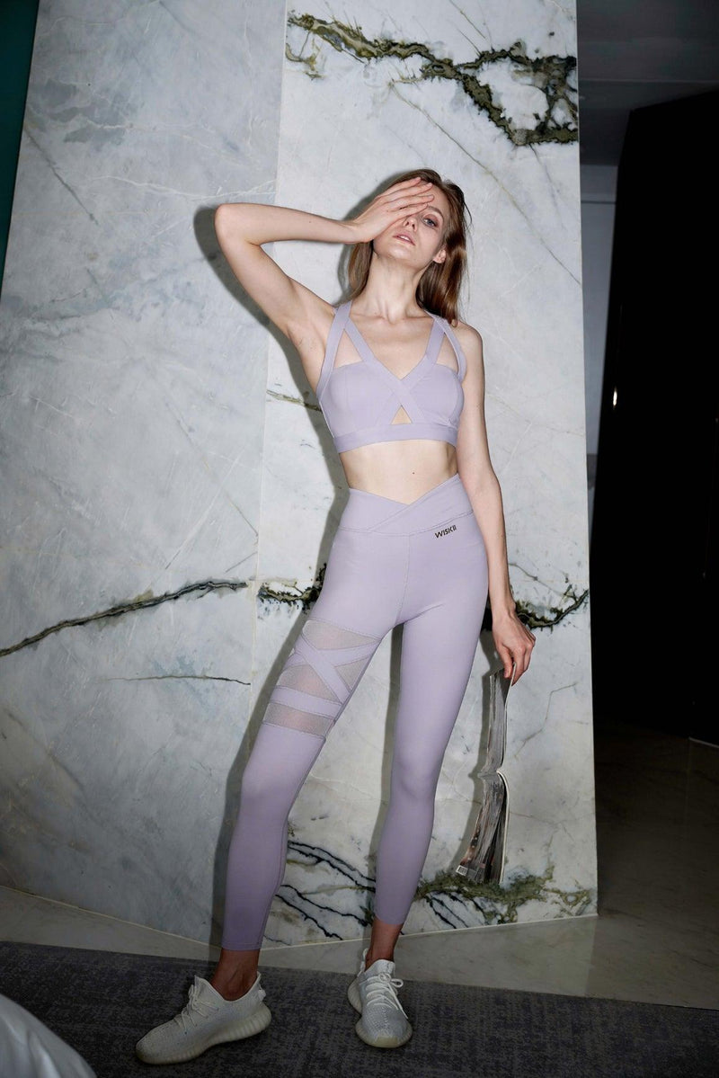 model wears a training mesh leggings