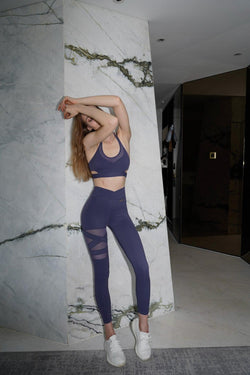 Model wears a WISKII training mesh leggings