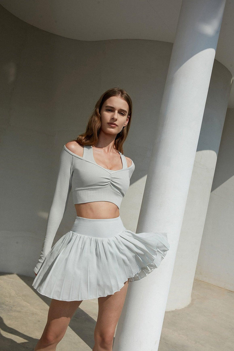The Dawn sports pleated skirts were worn by a model.