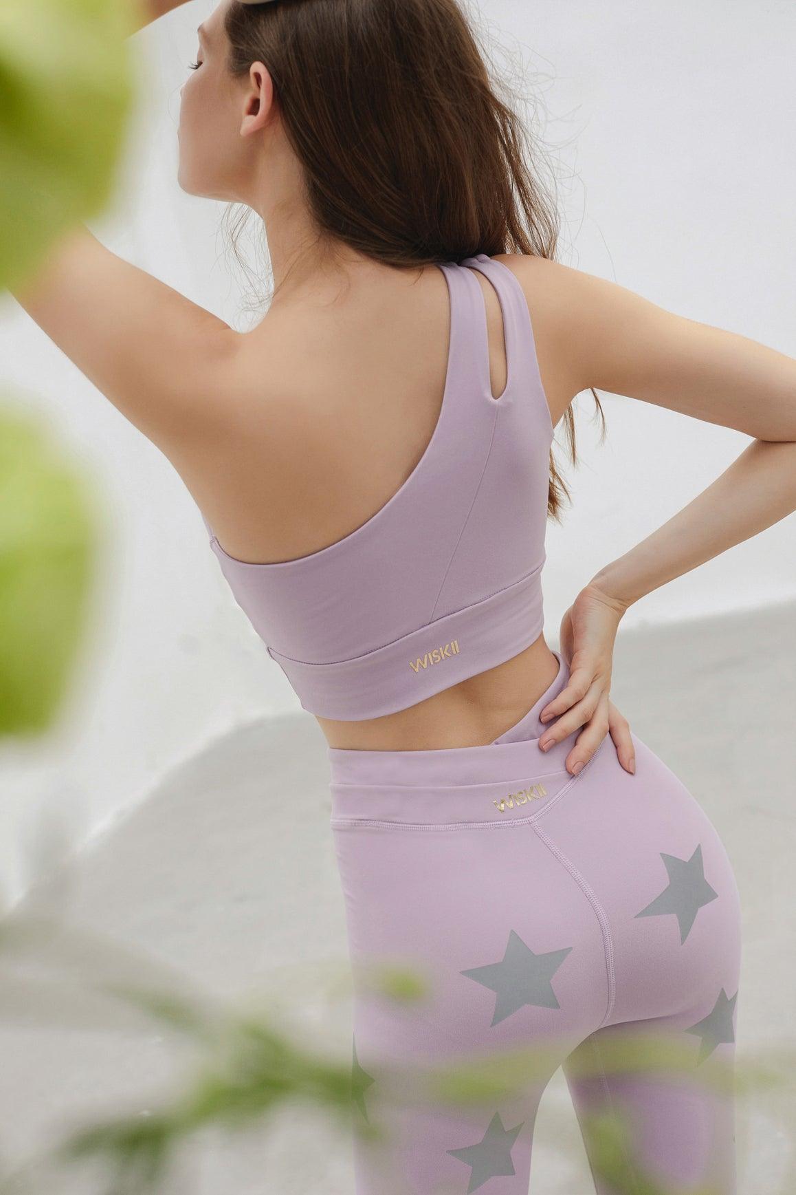 Ivory WISKII Dynamic Sports Bra with supportive fit and breathable fabric, designed for comfort during workouts.